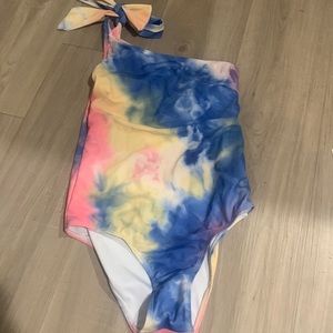 Colorful one piece swim suit.